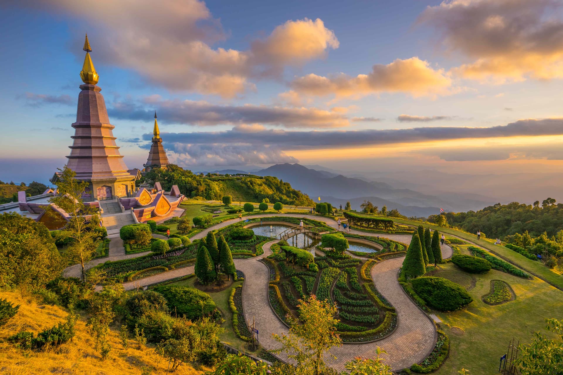 Doi Inthanon twin pagodas at sunset in Chiang Mai mountains - where transformation happens
